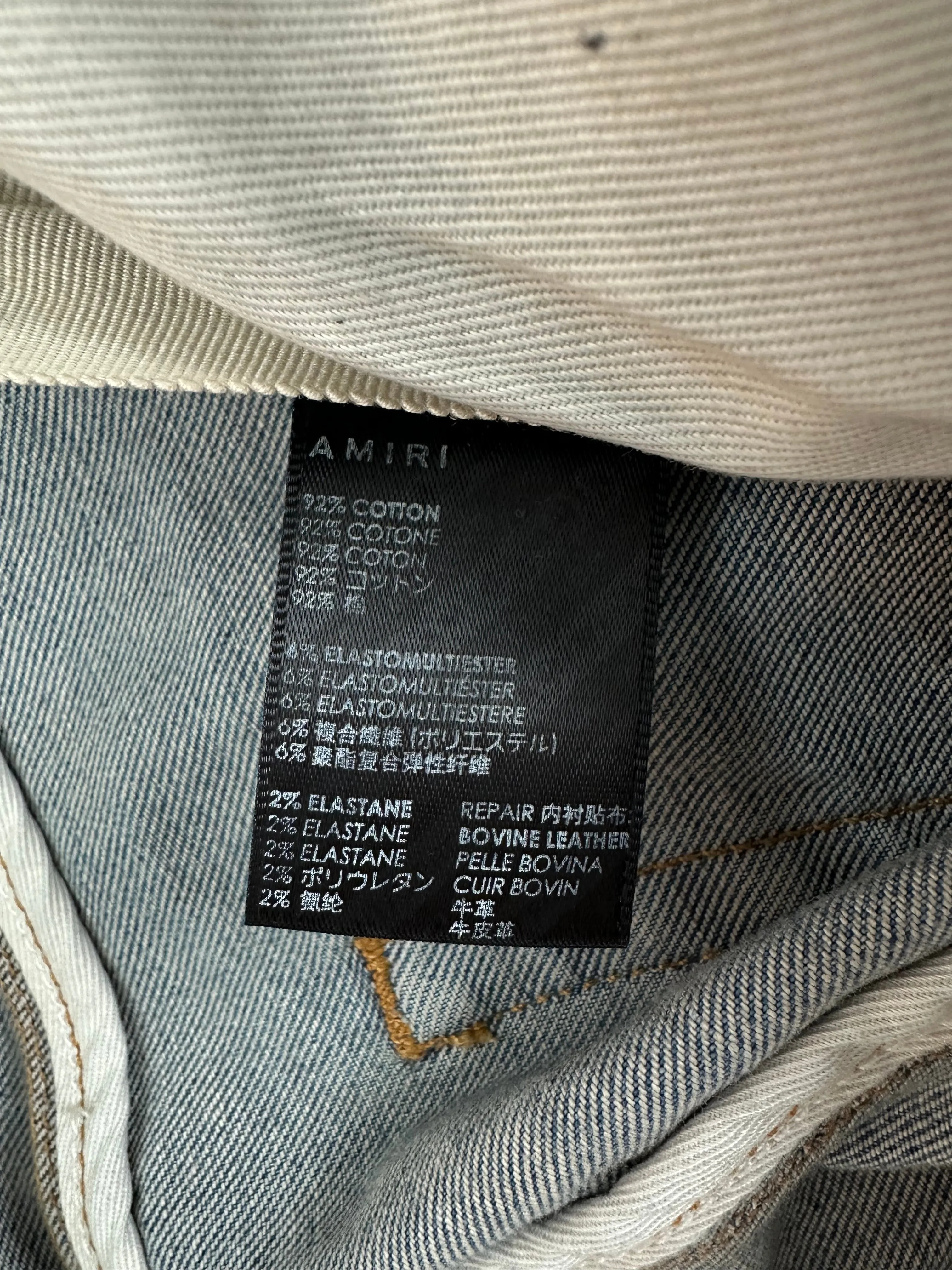 Amiri Clay Indigo Red Flannel Core Applique Logo Jeans