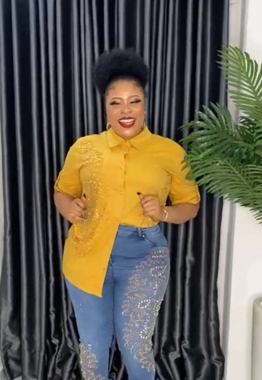 PTA Beaded Gold shirt & Blue Crazy jeans.